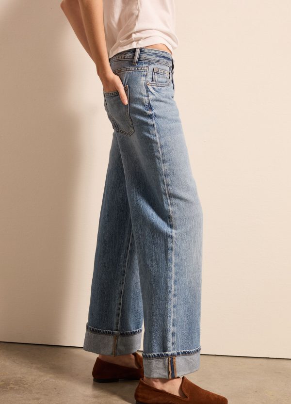 Jeans a gamba larga con risvolti - Image 2
